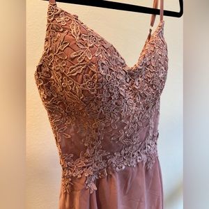 Lace bodice floor length gown with slit. Never worn. Tag on.